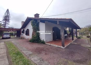 Casa com 162m², 3 dormitórios, 3 suítes, 4 vagas, no bairro Atlântida em Xangri-Lá