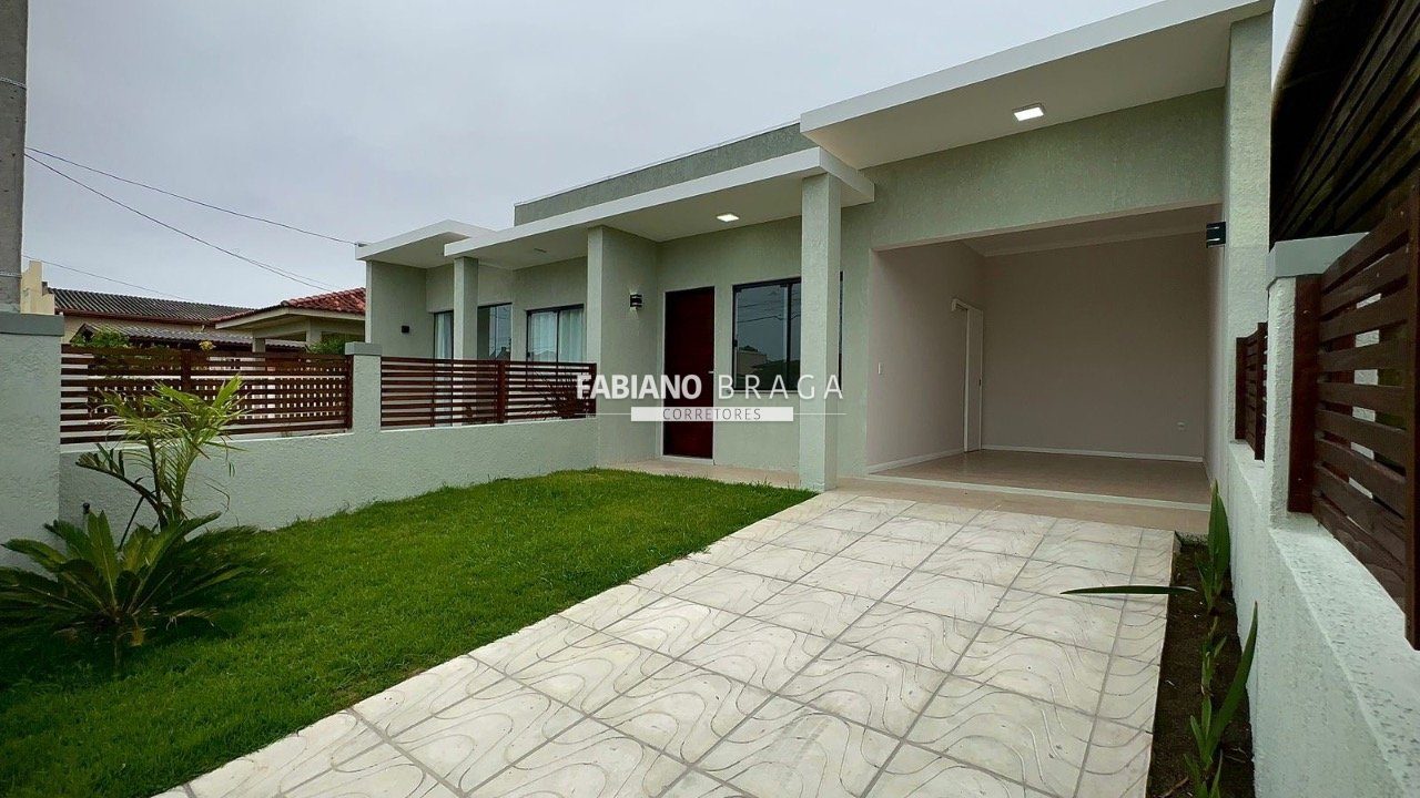 Casa com 96m², 2 dormitórios, 1 suíte, no bairro Centro em Xangri-lá