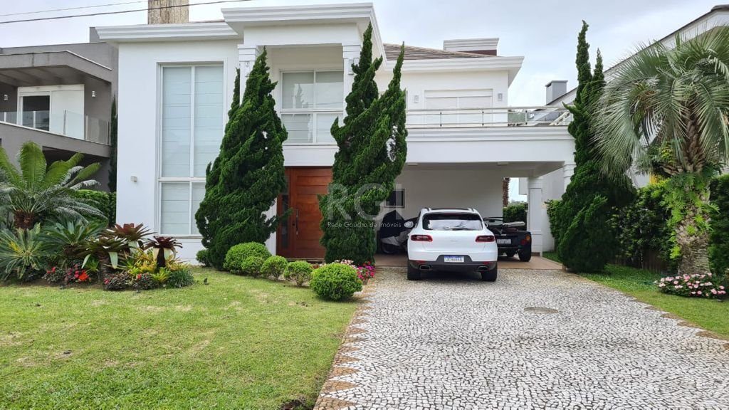 Sobrado com 435m², 4 dormitórios, 4 suítes, 4 vagas, Bosques de Atlântida em Xangri-lá