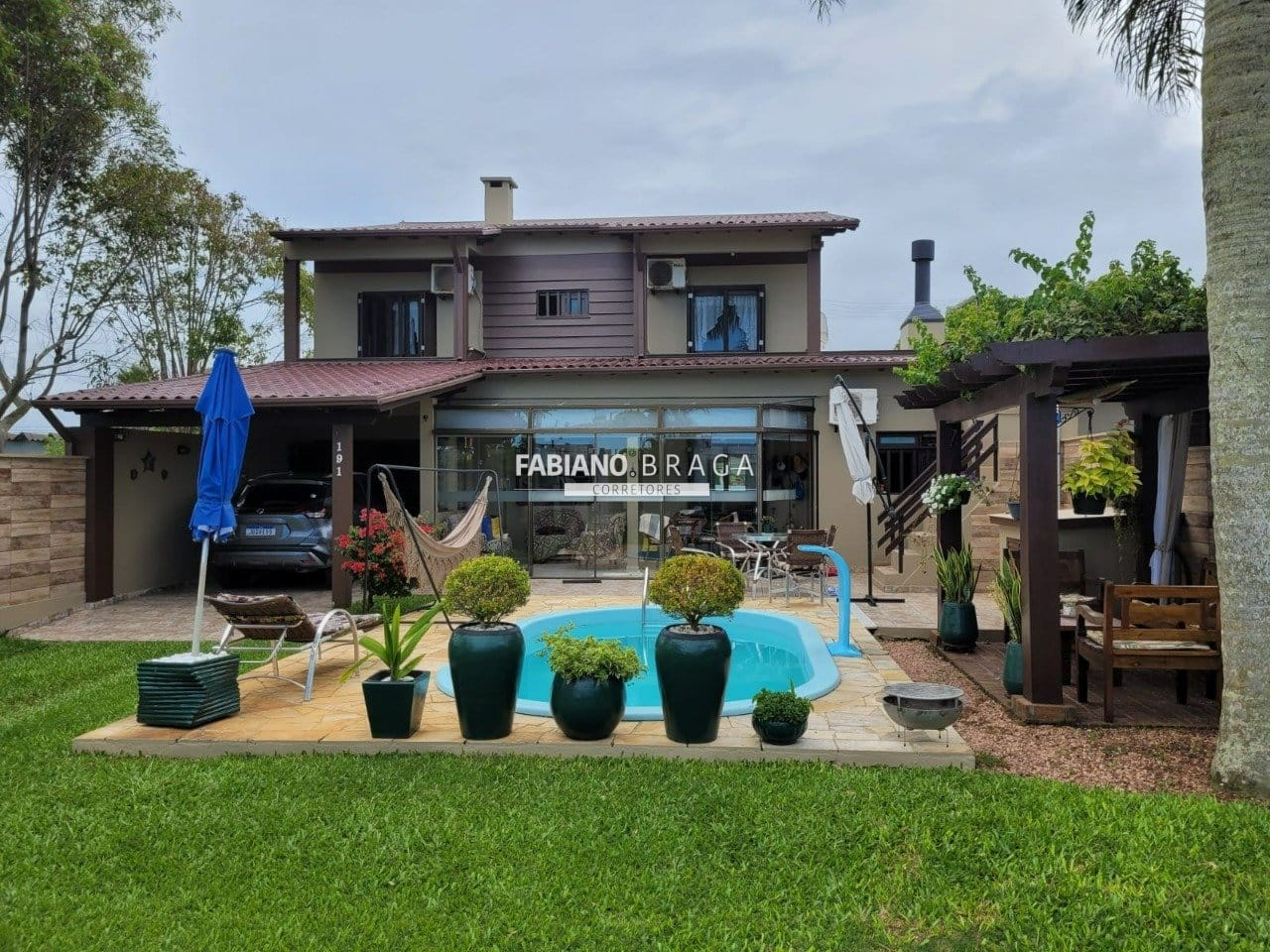 Casa com 144m², 2 dormitórios, 2 suítes, 2 vagas, no bairro Remanso em Xangri-Lá