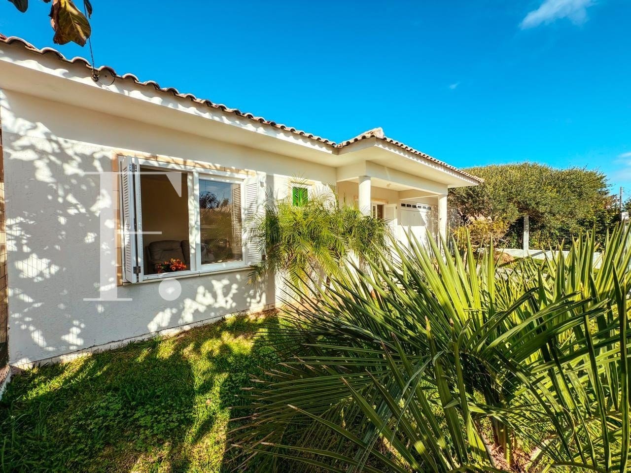 Casa com 131m², 3 dormitórios, 1 suíte, 2 vagas, no bairro Praia Maristela em Xangri-Lá
