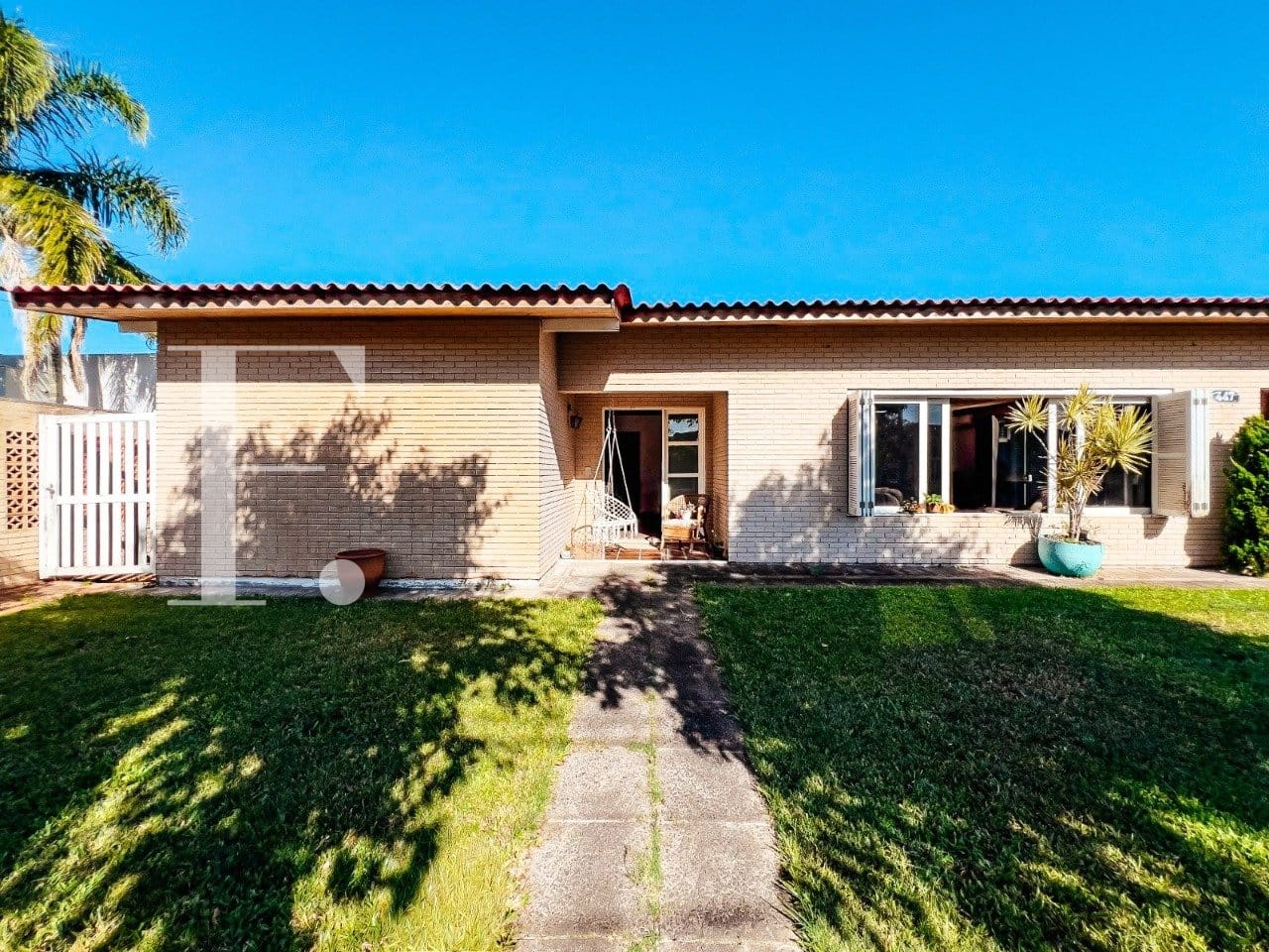 Casa com 230m², 3 dormitórios, 1 suíte, 2 vagas, no bairro Atlântida em Xangri-Lá