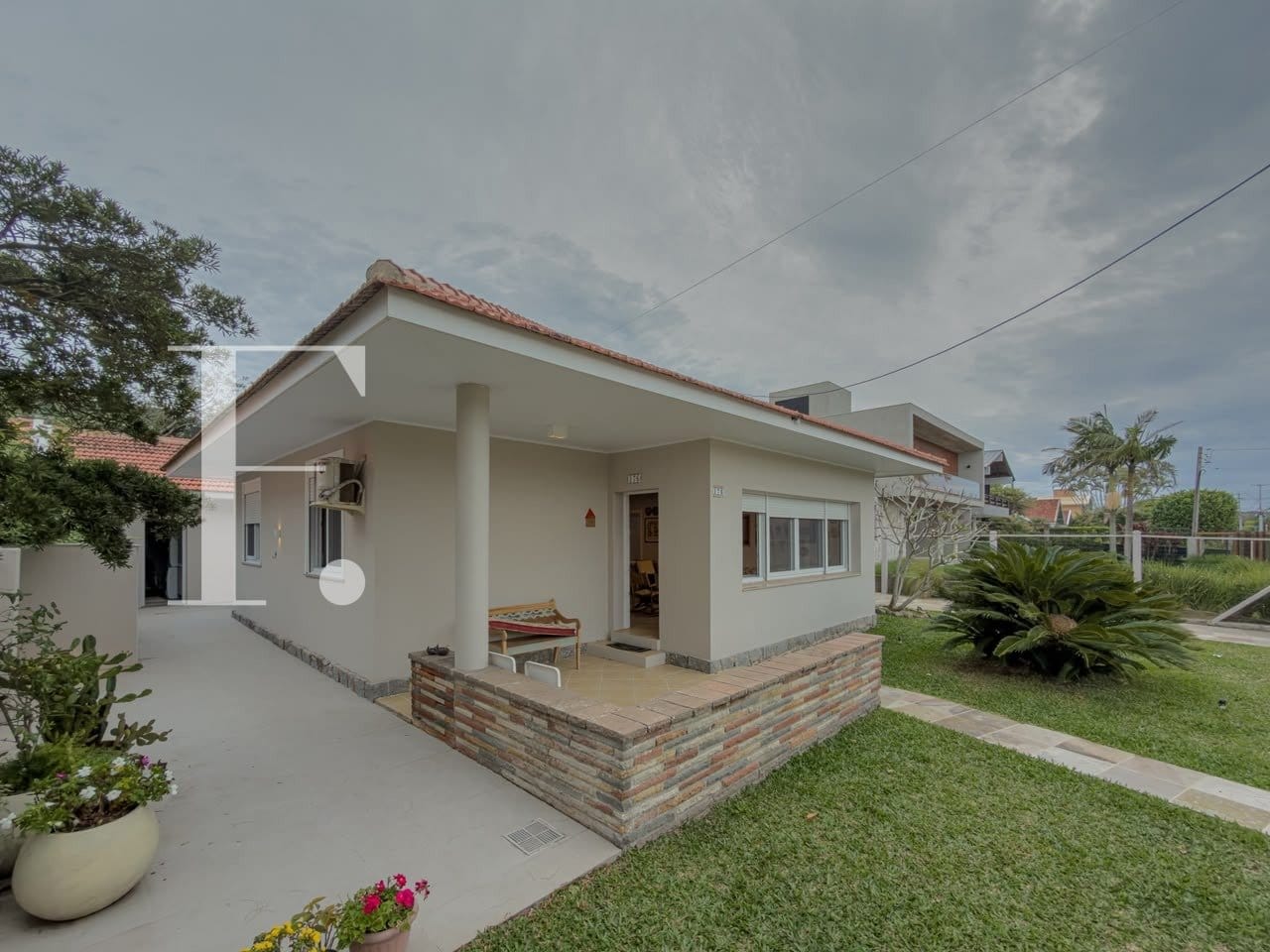 Casa com 250m², 4 dormitórios, 2 vagas, no bairro Atlântida em Xangri-Lá