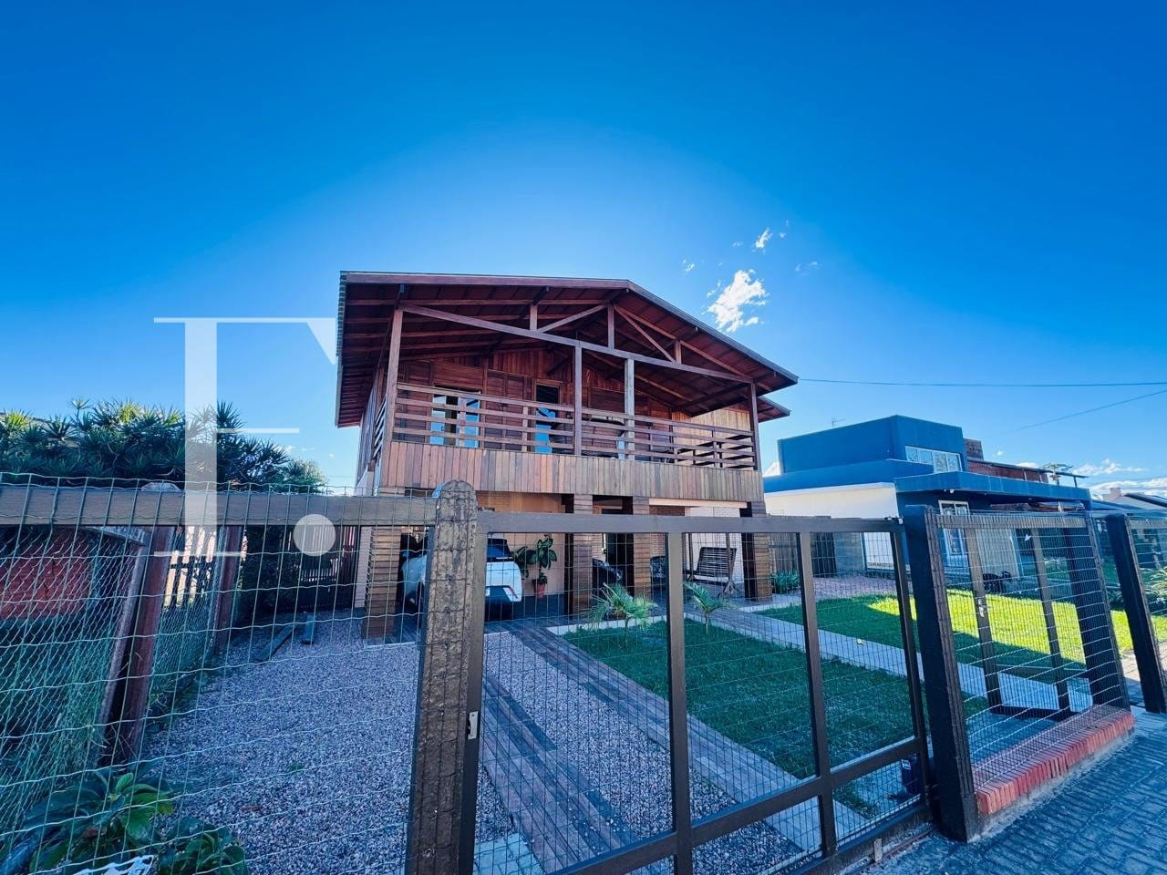 Casa com 250m², 5 dormitórios, 2 suítes, 2 vagas, no bairro Atlântida em Xangri-Lá