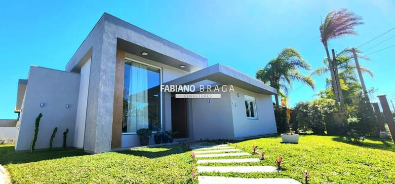 Casa com 165m², 3 dormitórios, 2 suítes, 2 vagas, no bairro Atlântida em Xangri-Lá