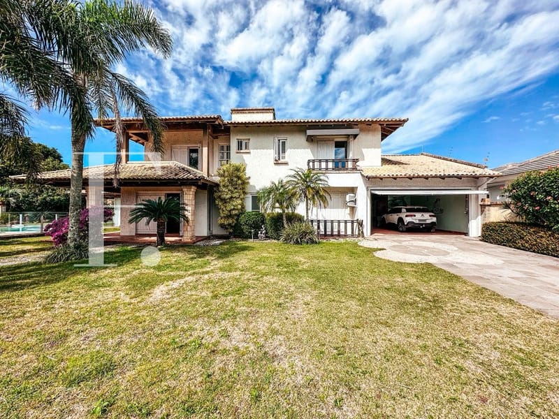 Casa com 420m², 4 dormitórios, 1 suíte, 2 vagas, no bairro Atlântida em Xangri-Lá