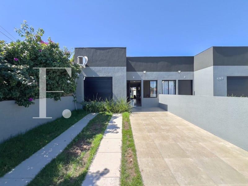 Casa com 70m², 2 dormitórios, 1 suíte, 2 vagas, no bairro Marina em Xangri-Lá