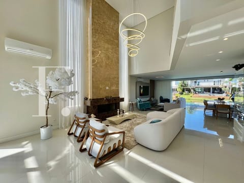Sobrado com 345m², 4 dormitórios, 4 suítes, 2 vagas, Malibu em Xangri-Lá