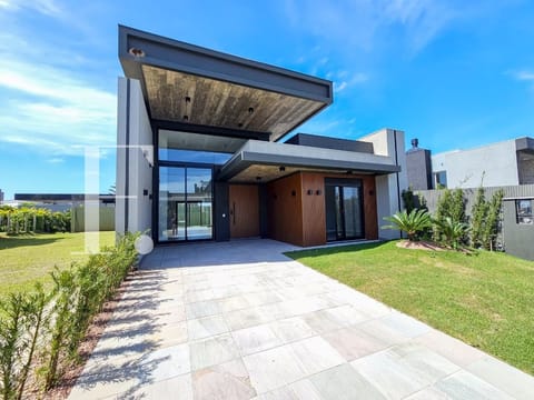Casa Condomínio com 150m², 4 dormitórios, 4 suítes, 2 vagas, Sunset em Xangri-Lá