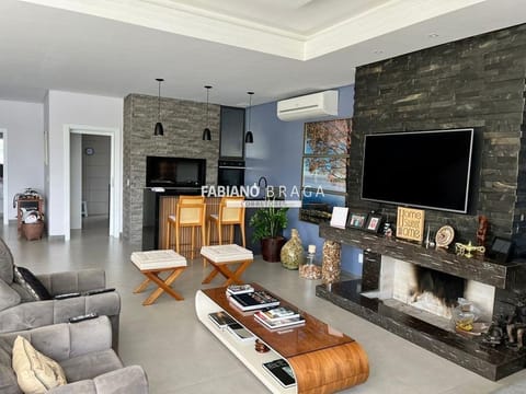 Sobrado com 350m², 6 dormitórios, 6 suítes, 4 vagas, Celebration em Xangri-Lá