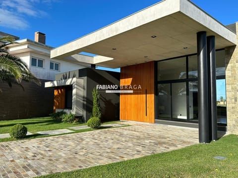 Casa Condomínio com 625m², 4 dormitórios, 4 suítes, 2 vagas, Riviera em Xangri-Lá