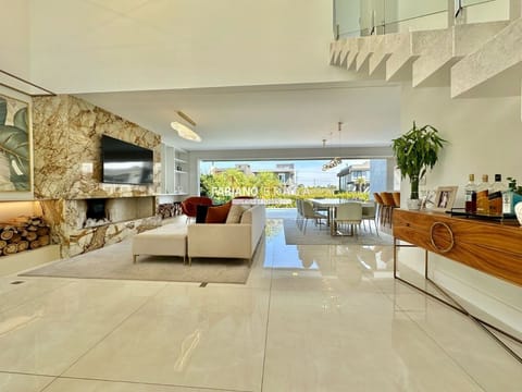 Sobrado com 220m², 3 dormitórios, 3 suítes, 2 vagas, Capão Ilhas Resort em Capão da Canoa