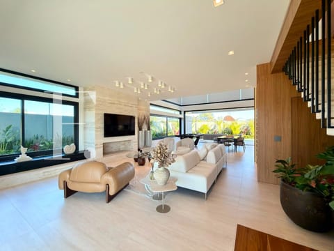 Sobrado com 410m², 5 dormitórios, 5 suítes, 2 vagas, Lótus em Xangri-Lá