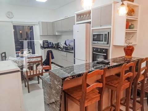 Casa com 145m², 3 dormitórios, 3 suítes, 2 vagas, Santorini em Xangri-Lá
