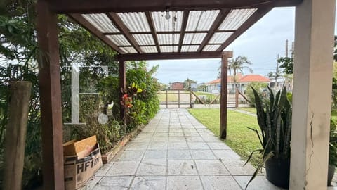 Casa com 150m², 4 dormitórios, 3 vagas, no bairro Centro em Xangri-Lá
