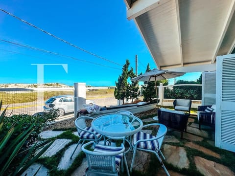 Casa com 280m², 5 dormitórios, 2 suítes, 2 vagas, no bairro Atlântida em Xangri-Lá