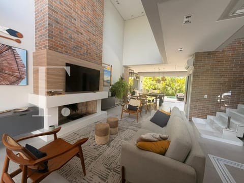 Sobrado com 208m², 4 dormitórios, 4 suítes, 2 vagas, Sunset em Xangri-Lá