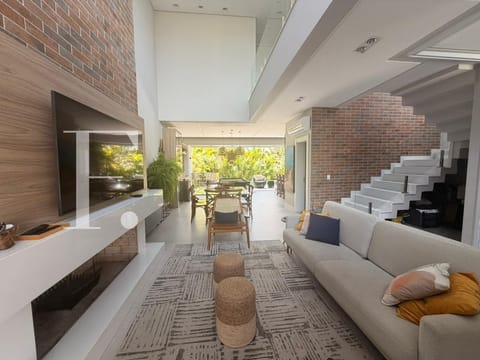 Sobrado com 208m², 4 dormitórios, 4 suítes, 2 vagas, Sunset em Xangri-Lá