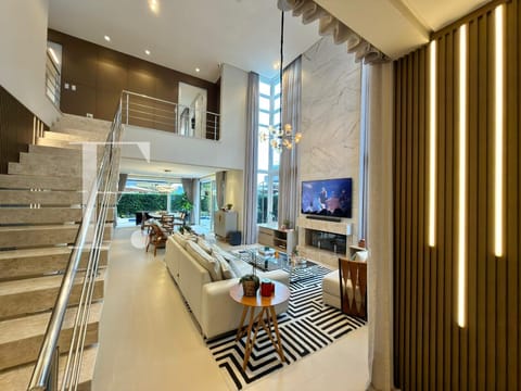 Sobrado com 240m², 4 dormitórios, 4 suítes, 2 vagas, Malibu em Xangri-Lá