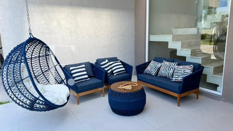 Sobrado com 214m², 4 dormitórios, 4 suítes, Sunset em Xangri-Lá