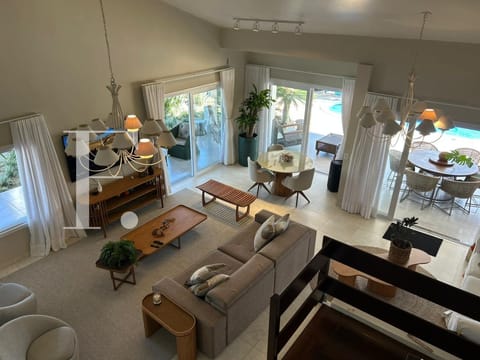Casa com 400m², 6 dormitórios, 6 suítes, 4 vagas, no bairro Atlântida em Xangri-Lá