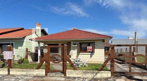 Casa com 360m², 3 dormitórios, 1 suíte, 2 vagas, no bairro Rainha do Mar em Xangri-Lá
