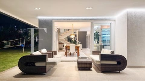 Sobrado com 334m², 5 dormitórios, 5 suítes, 3 vagas, Capão Ilhas Resort em Capão da Canoa