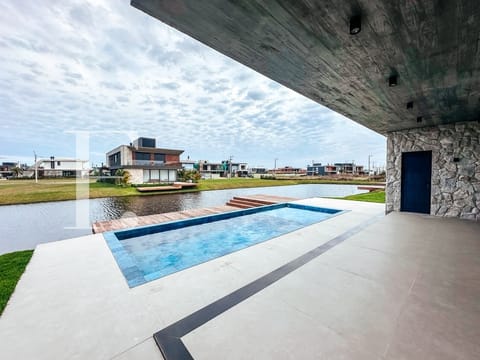 Sobrado com 361m², 5 dormitórios, 5 suítes, 2 vagas, Amare Home Resort em Xangri-Lá