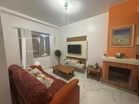 Sobrado com 136m², 3 dormitórios, 1 suíte, 1 vaga, no bairro Centro em Xangri-Lá