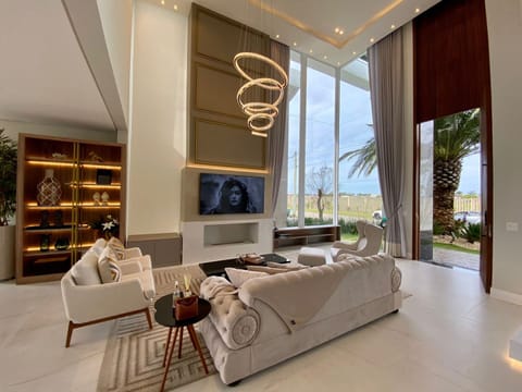 Sobrado com 260m², 4 dormitórios, 4 suítes, 2 vagas, Capão Ilhas Resort em Capão da Canoa